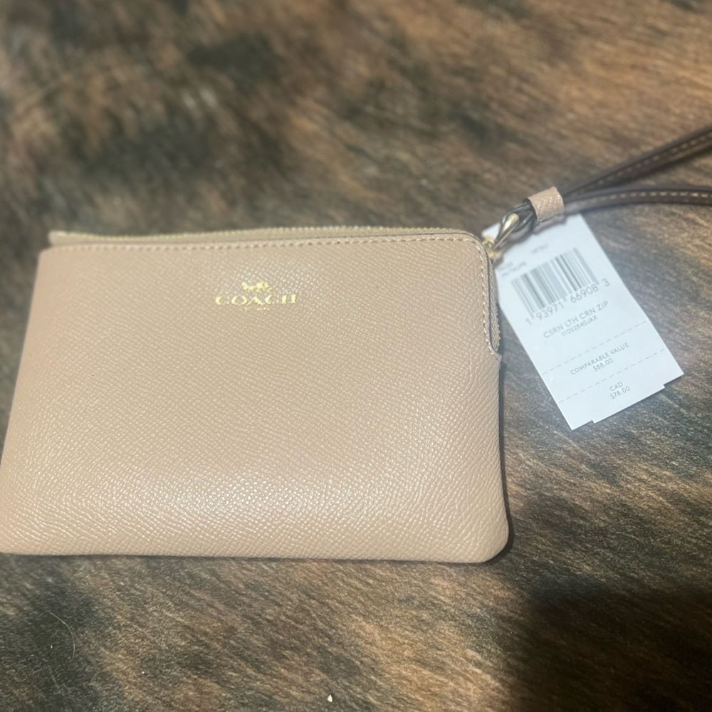 - Coach wristlet